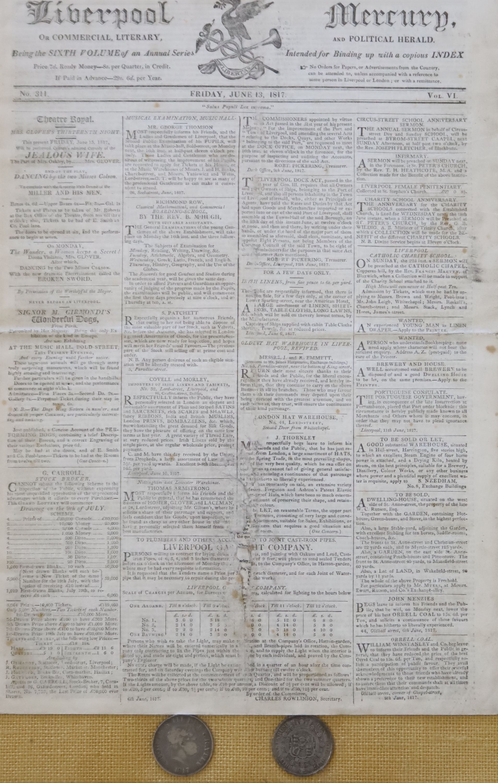 A framed page from Liverpool and Mercury 1817 and two 1817 coins